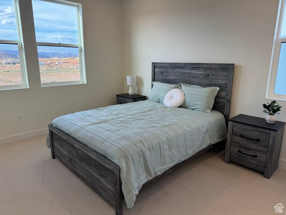 View of carpeted bedroom