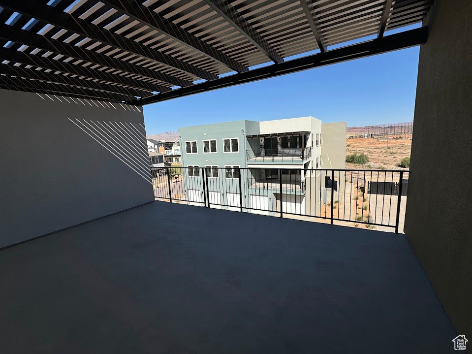 View of patio / terrace featuring a balcony