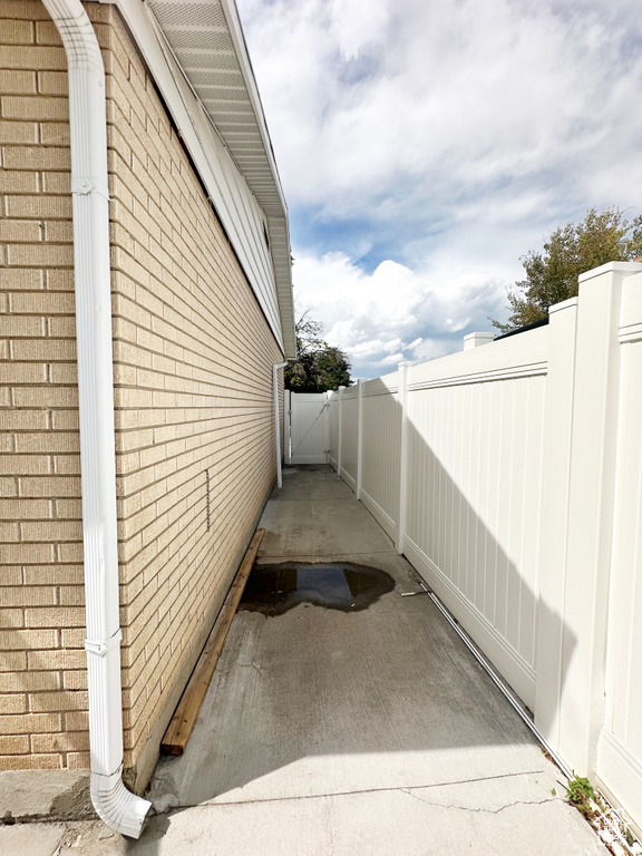 View of home's exterior with a patio