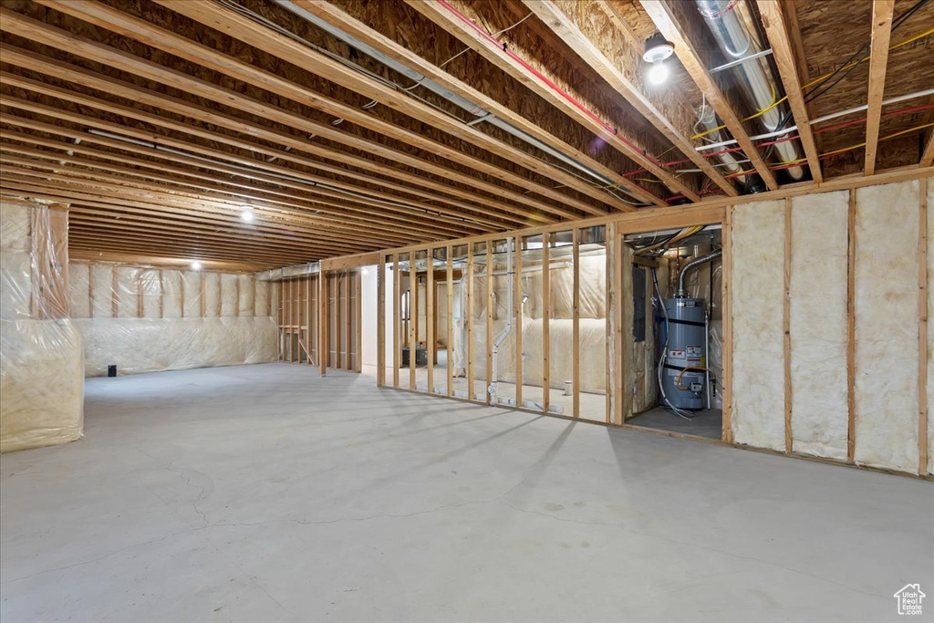 Basement with strapped water heater