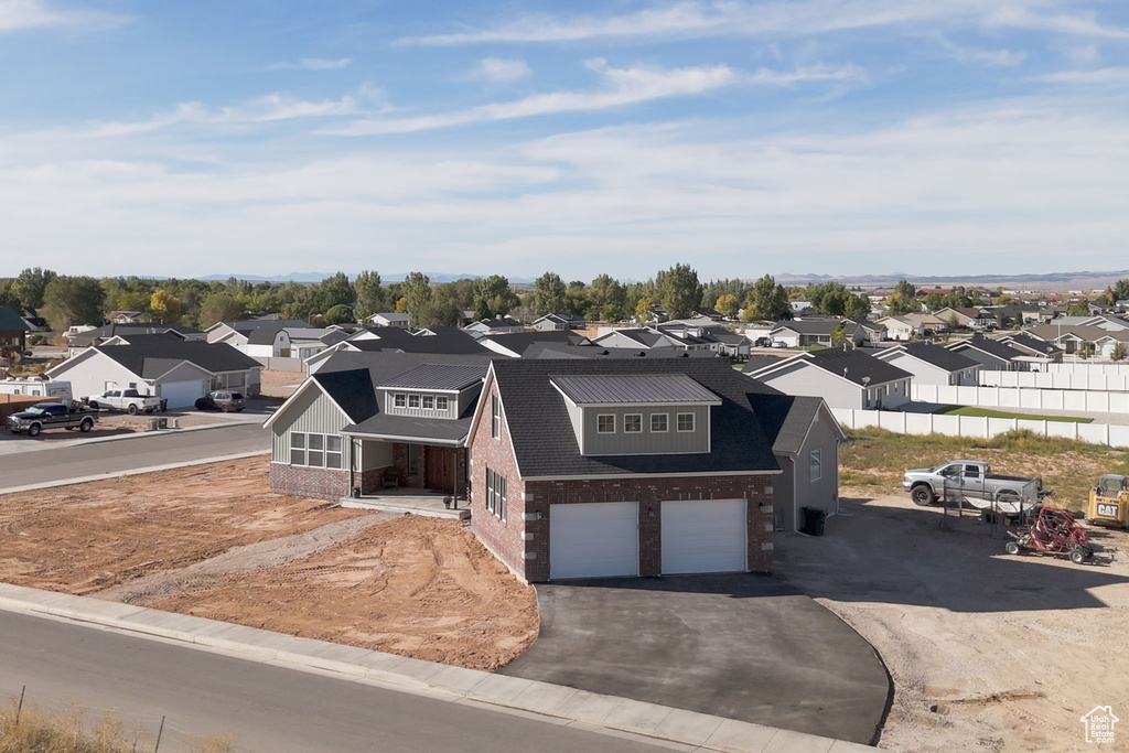 View of front of property featuring a garage