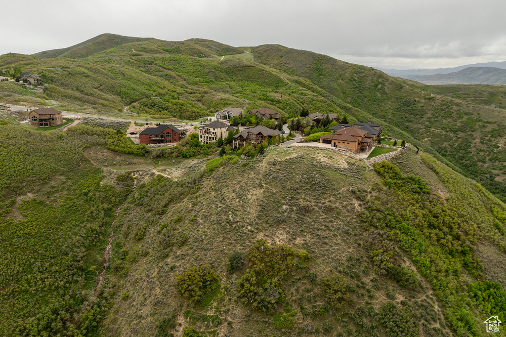 Aerial overview of property's location with mountains