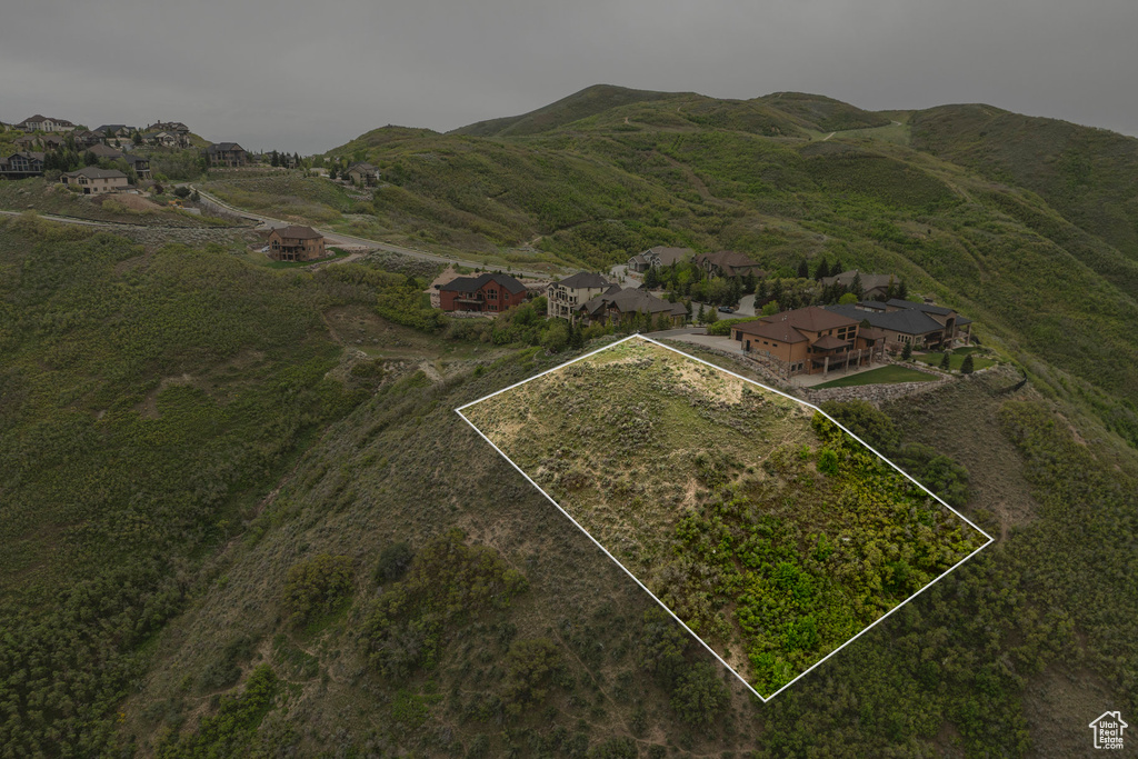 Aerial overview of property's location with property parcel outlined