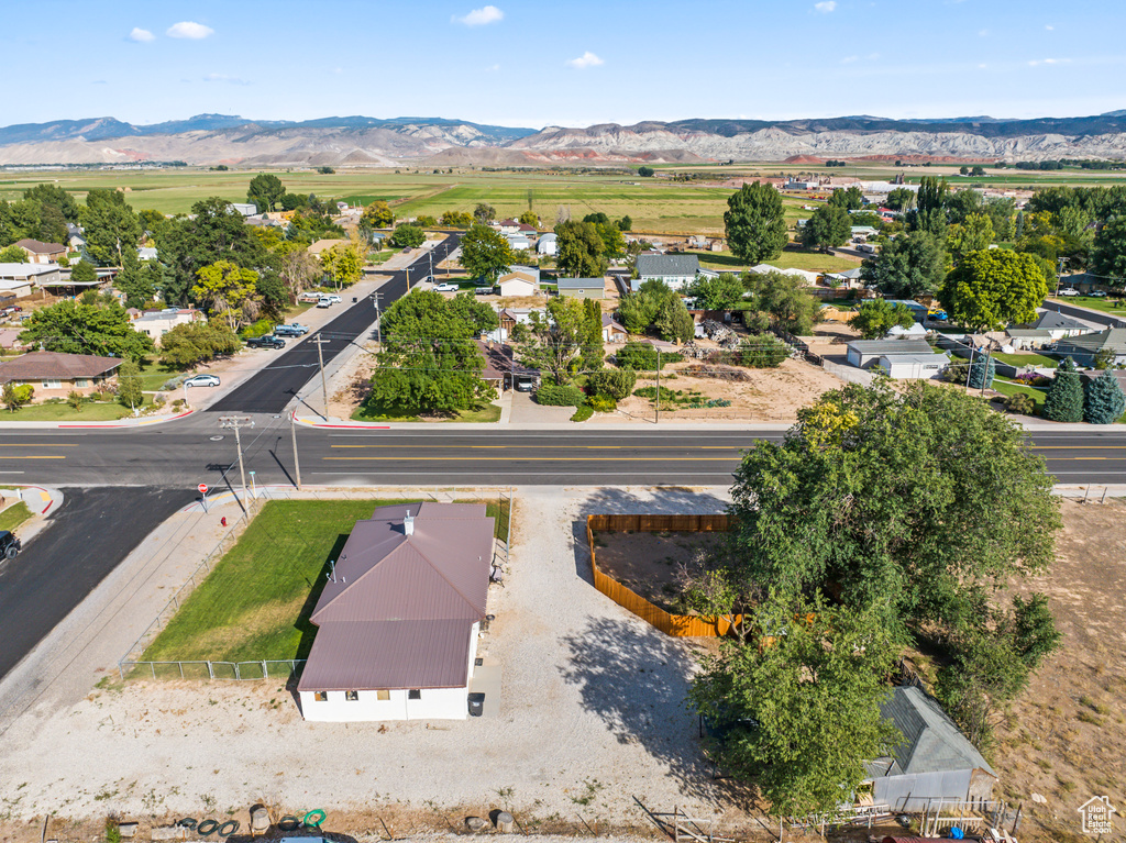 Birds eye view of property featuring a mountain view and a rural view