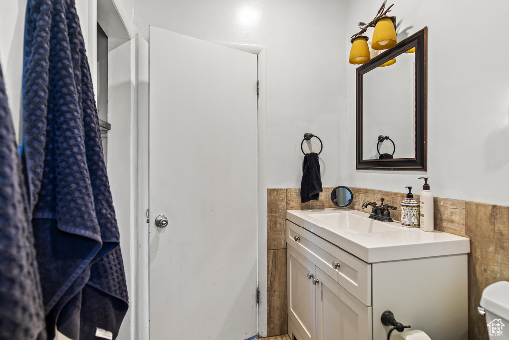 Bathroom with vanity and toilet