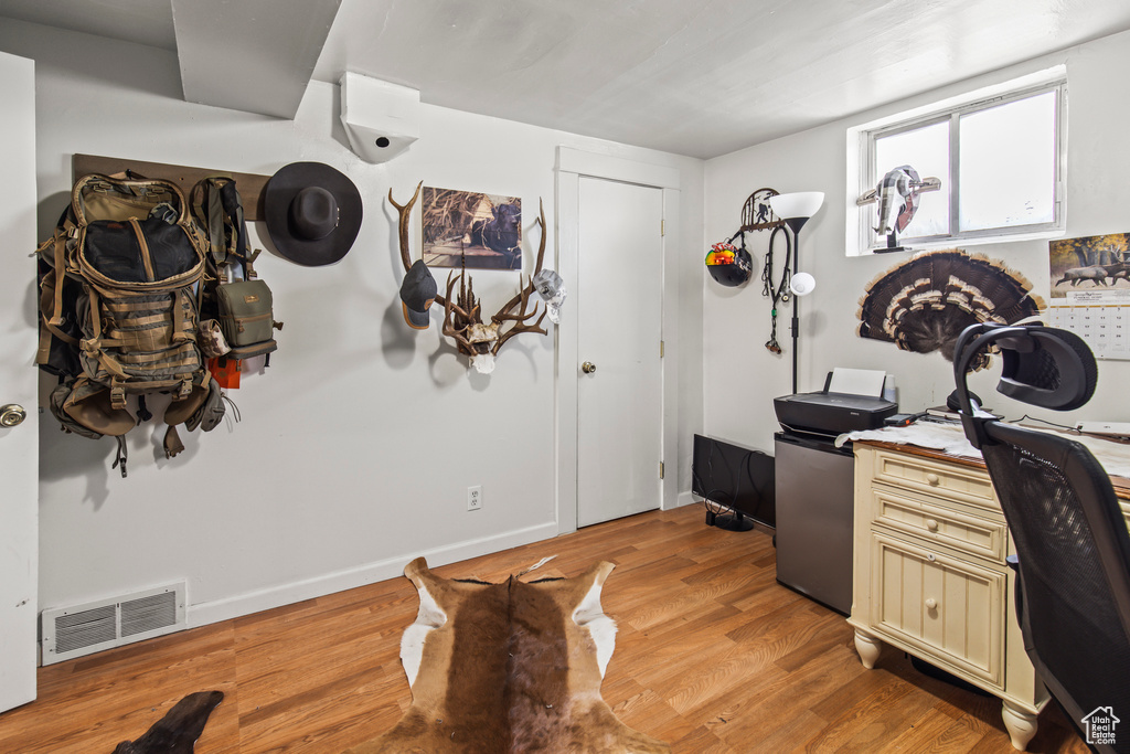 Office featuring light hardwood / wood-style floors