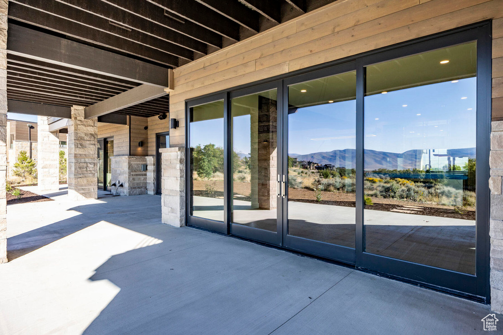 View of patio with a mountain view