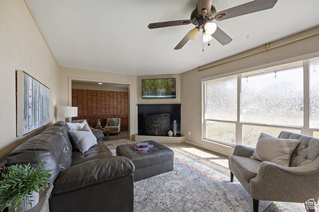 Living room featuring ceiling fan