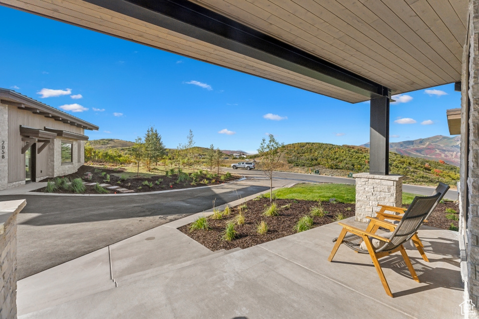 View of patio / terrace featuring a mountain view