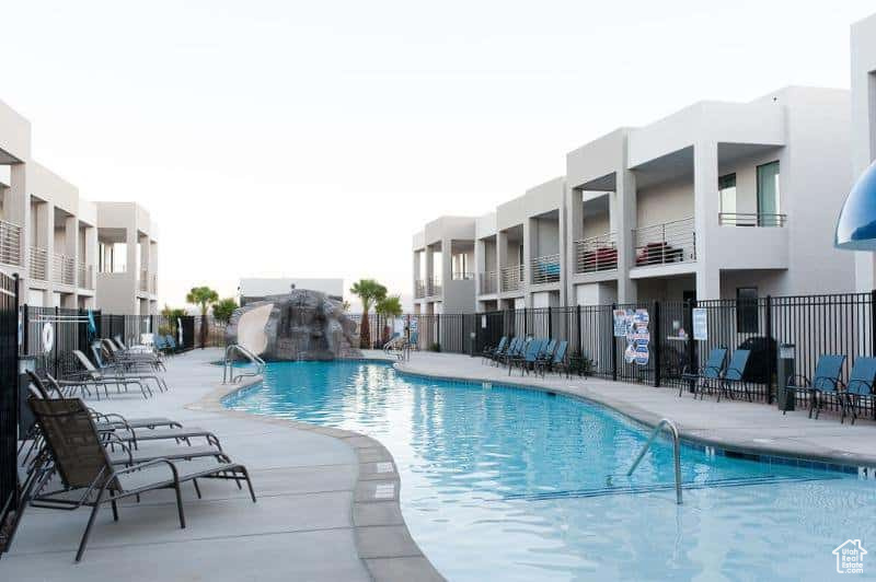 View of swimming pool featuring pool water feature