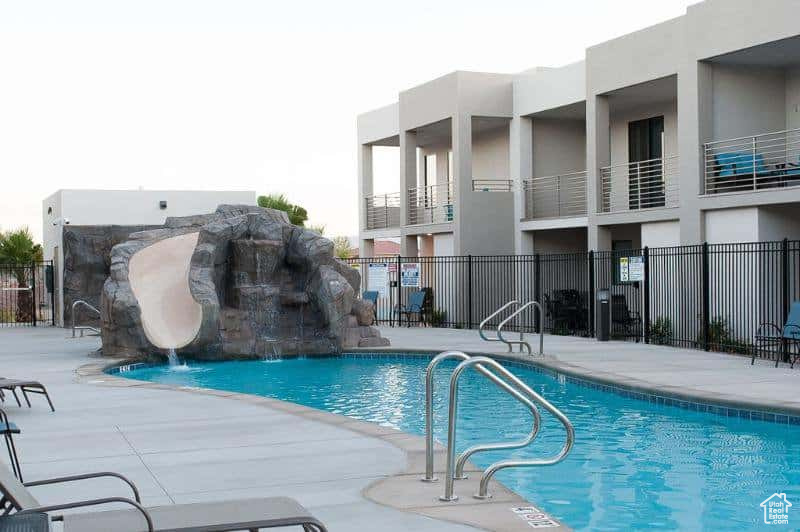 View of swimming pool featuring pool water feature