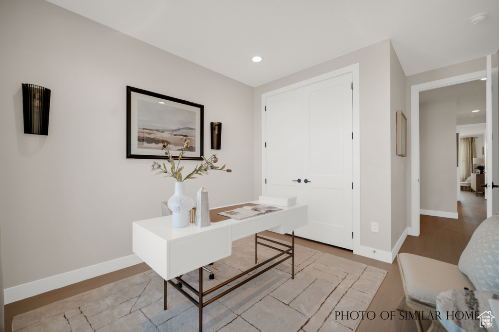 Home office featuring light hardwood / wood-style floors