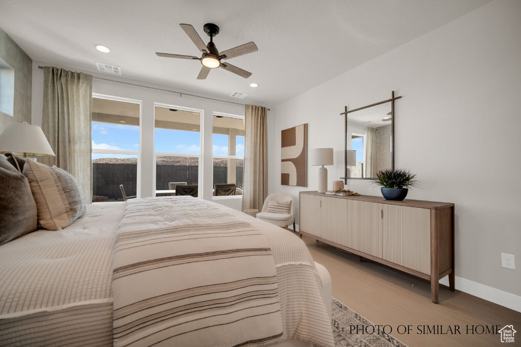 Bedroom featuring ceiling fan and light wood-type flooring