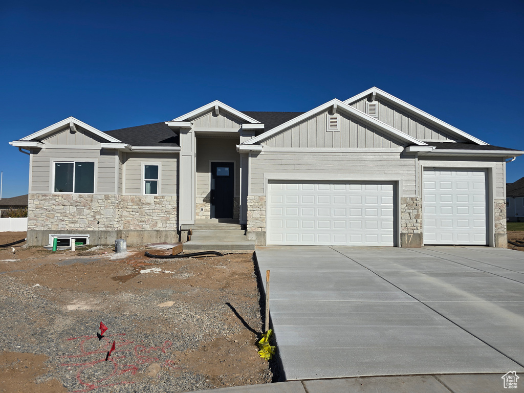 Craftsman-style home with a garage