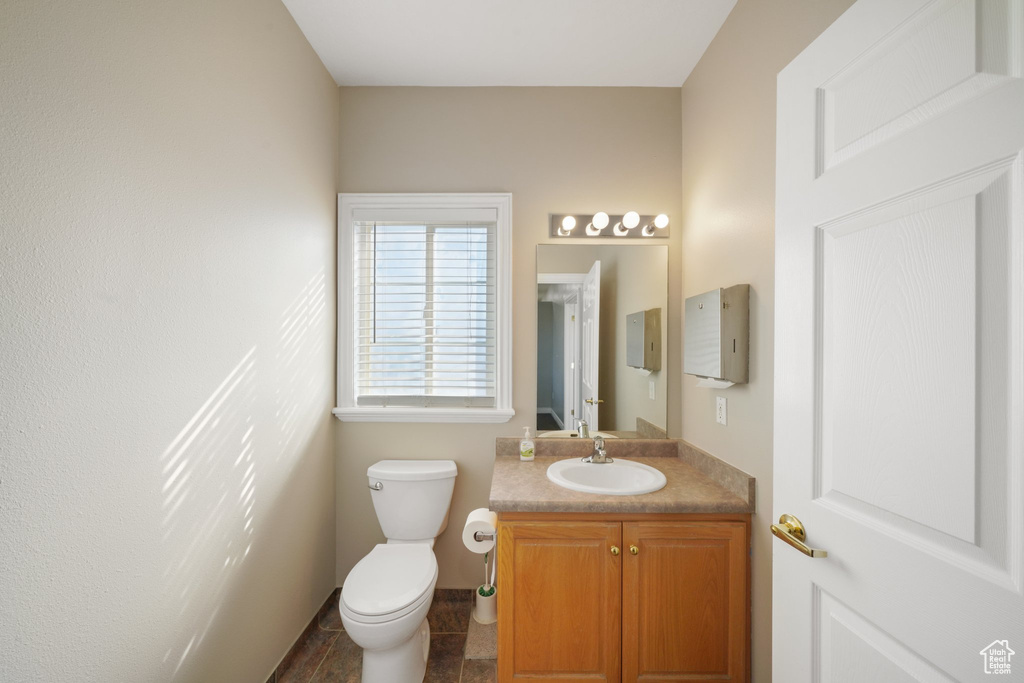 Bathroom with vanity and toilet