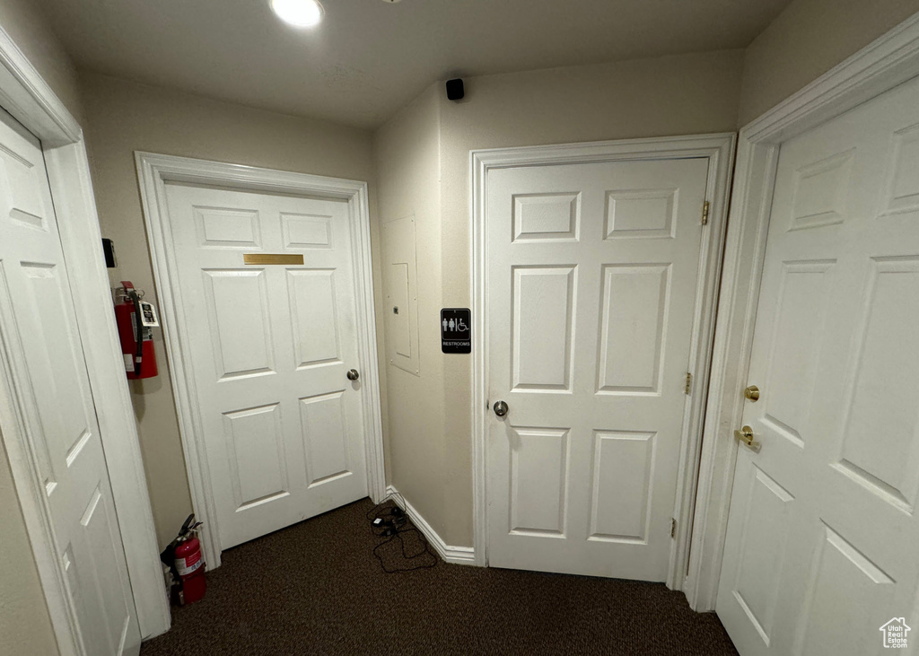 Hall with dark carpet