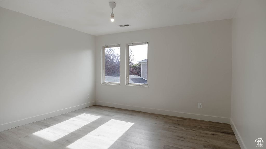 Spare room featuring light hardwood / wood-style flooring