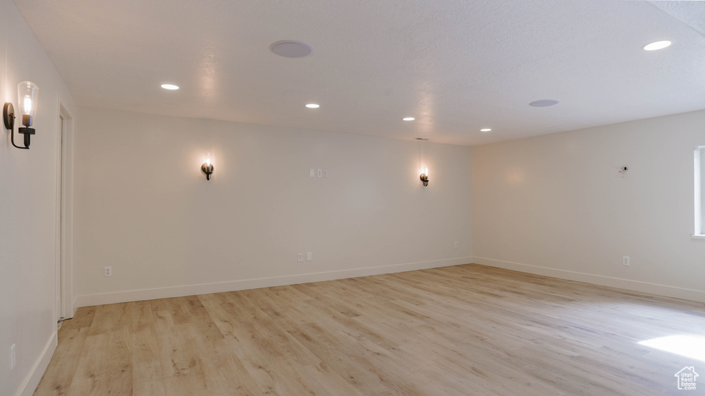 Unfurnished room with light hardwood / wood-style flooring