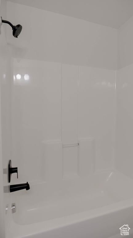 Bathroom with shower / bath combination