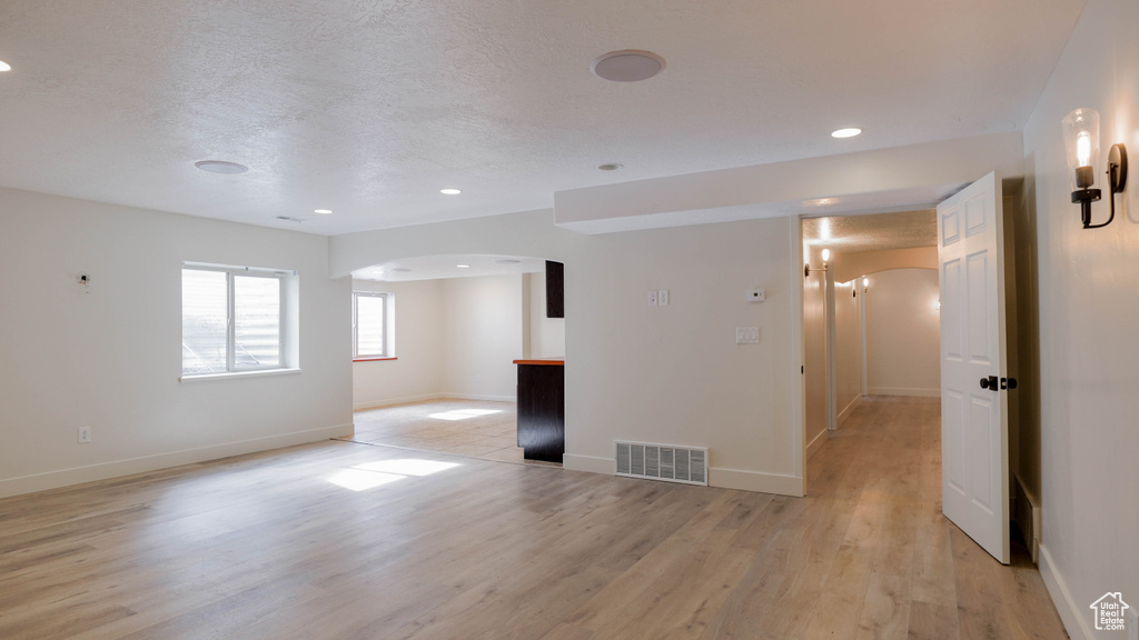 Empty room featuring light hardwood / wood-style floors