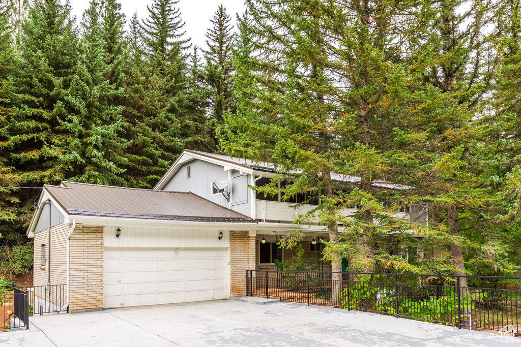 View of front of home featuring a garage