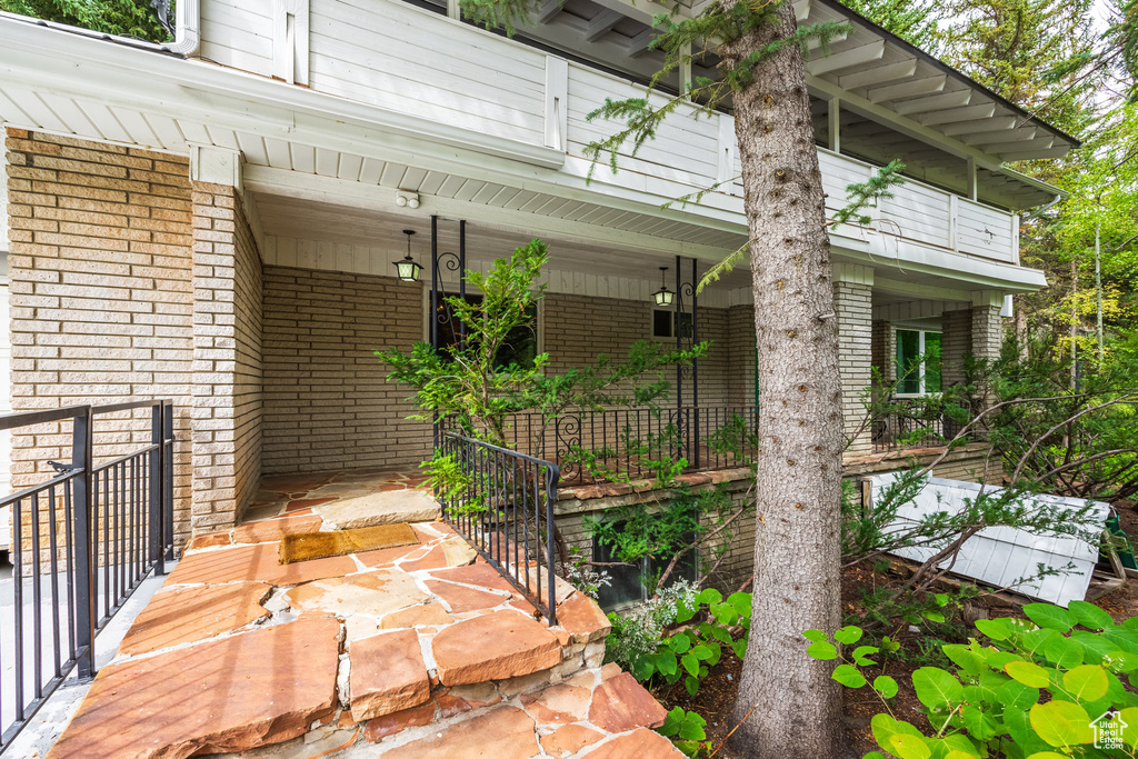 View of patio with a porch