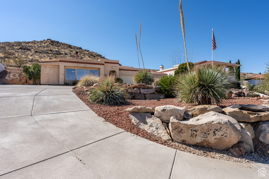 View of front of home with a mountain view