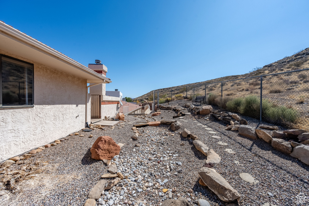 View of yard with a mountain view