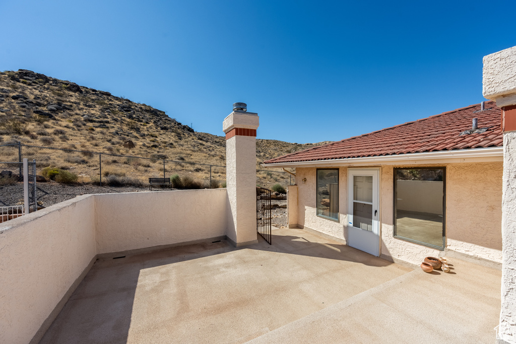 View of patio / terrace with a mountain view