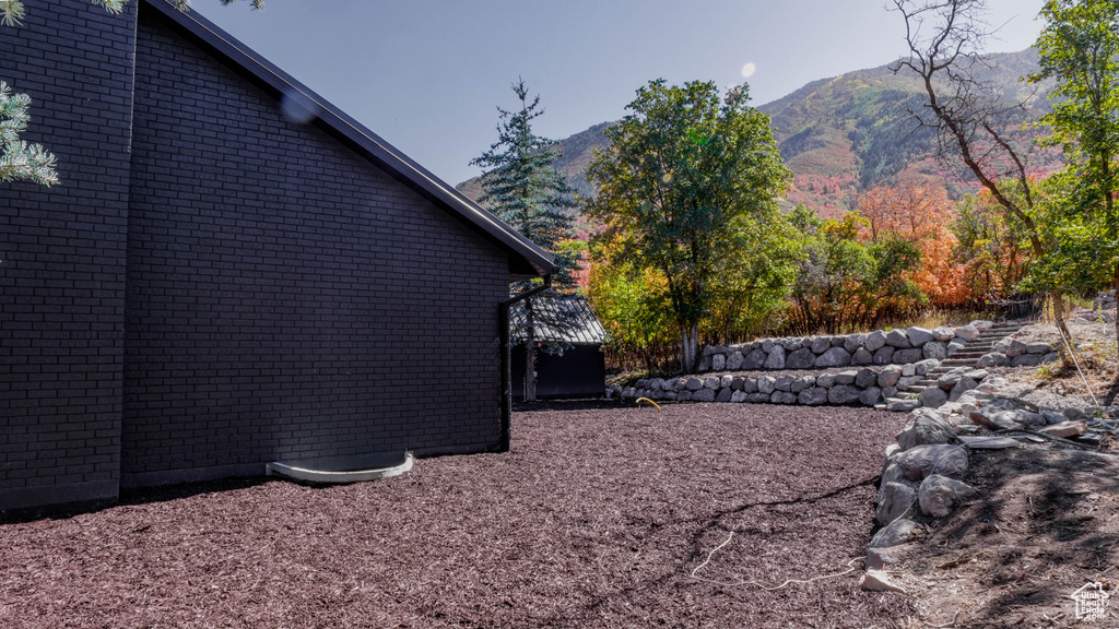 View of yard with a mountain view