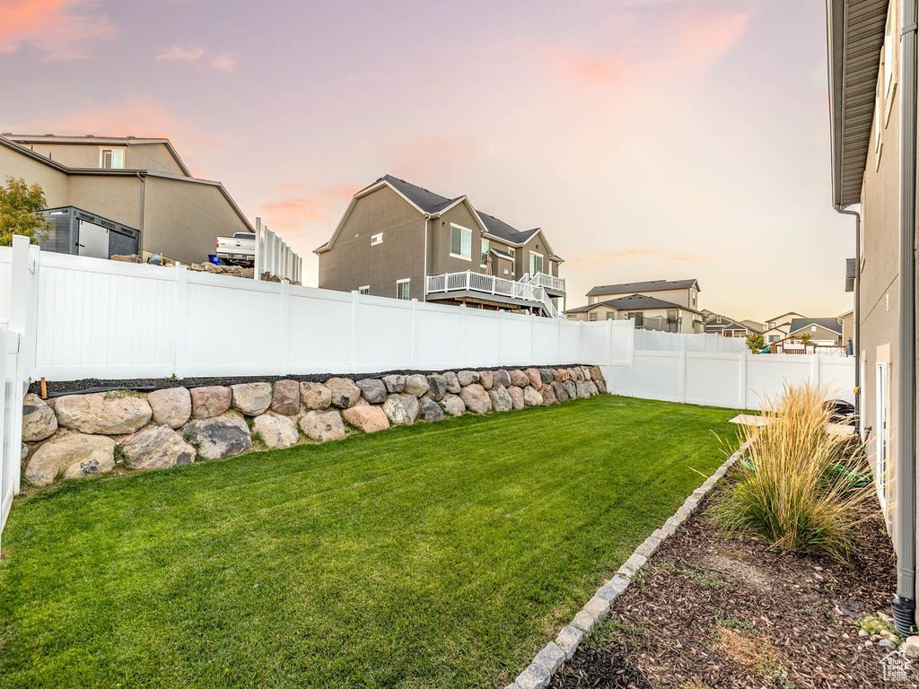 View of yard at dusk