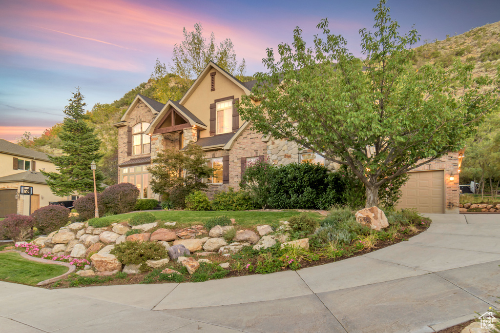 View of front of home featuring a garage