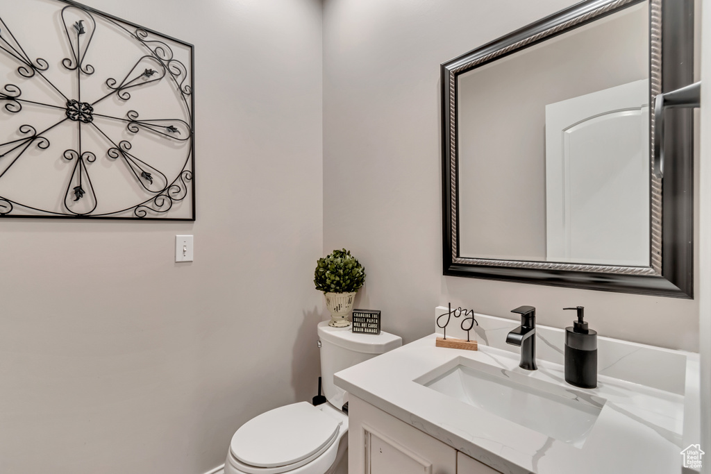 Bathroom with vanity and toilet