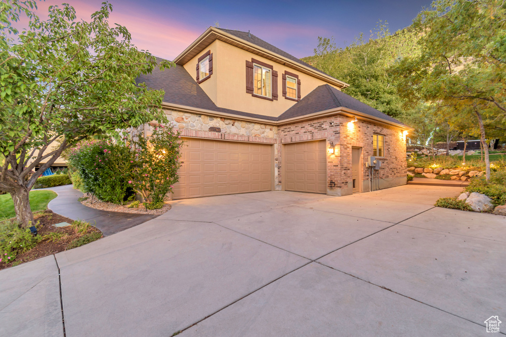 View of front of home featuring a garage