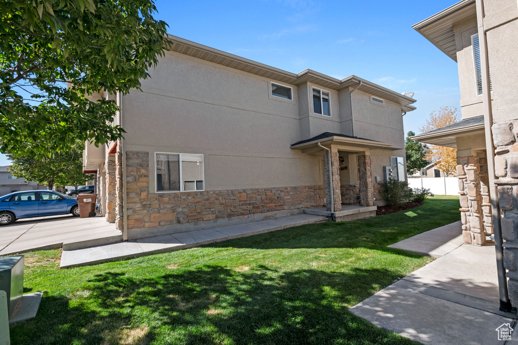 Exterior space with a front yard