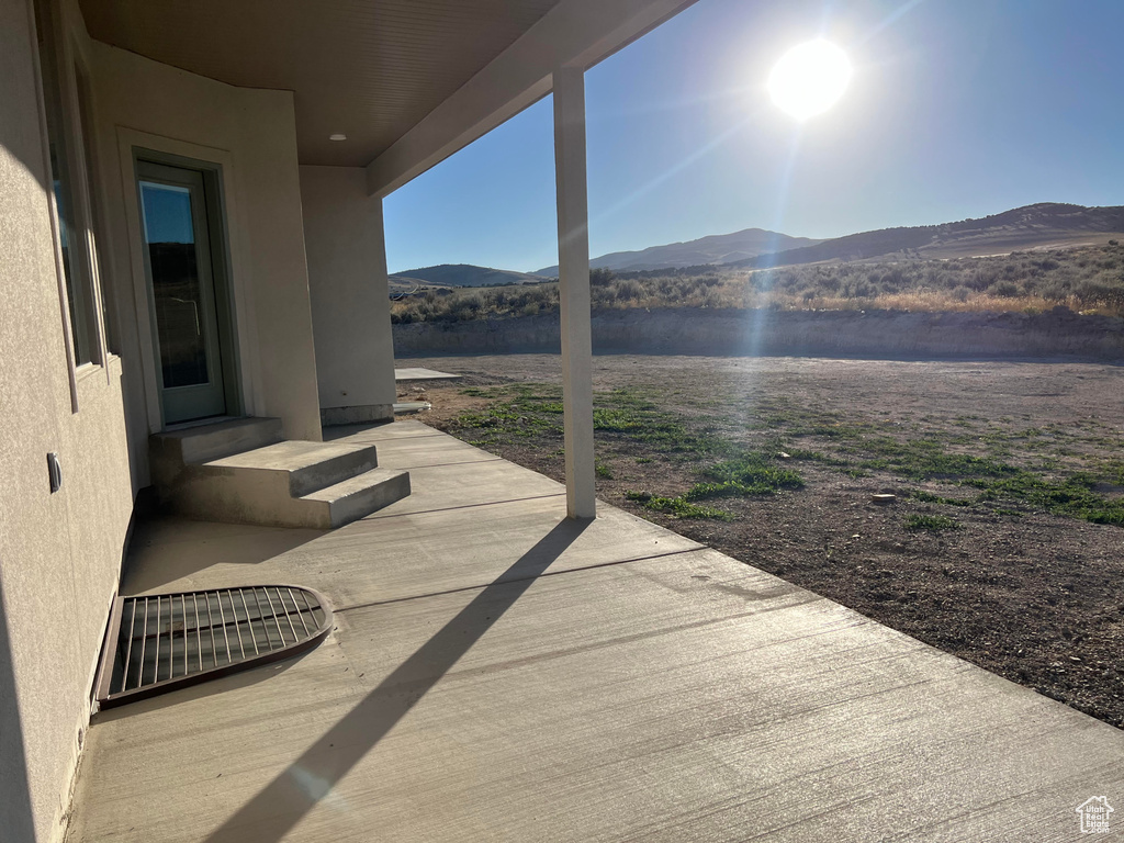 View of patio featuring a mountain view