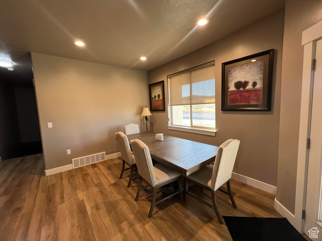 Dining space featuring wood-type flooring