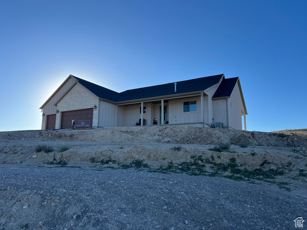 View of front of property featuring a garage