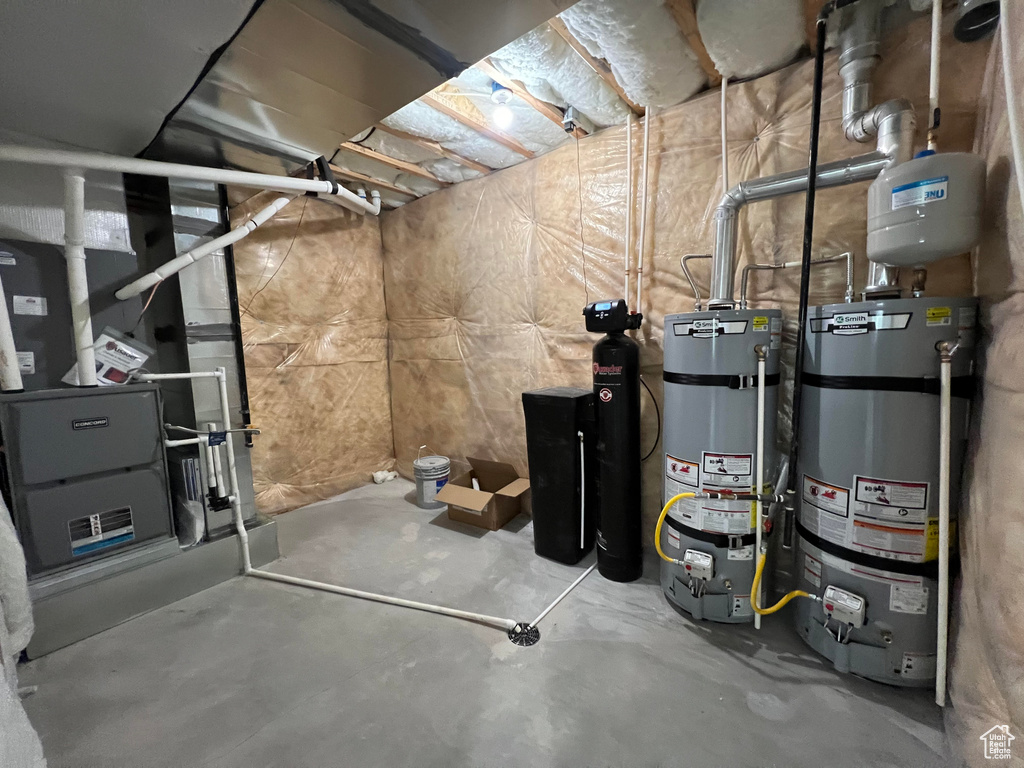 Basement with strapped water heater