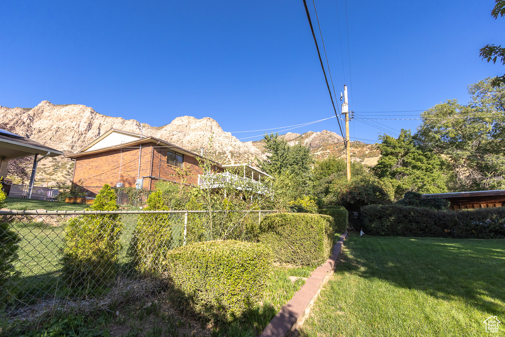 View of yard with a mountain view