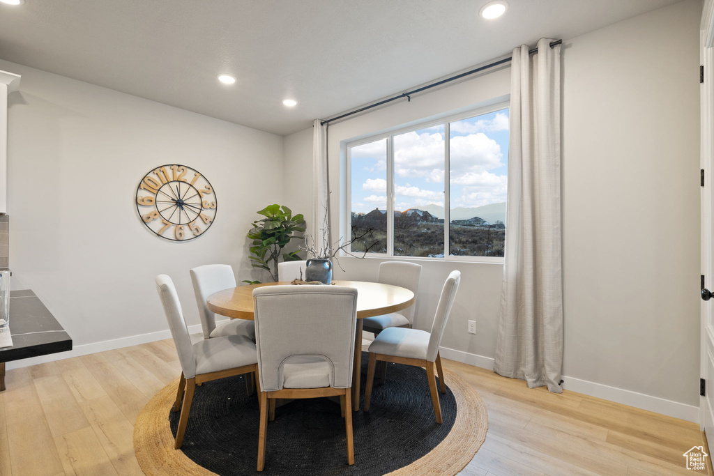 Dining space featuring light hardwood / wood-style floors