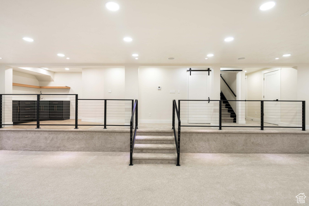 Staircase with a barn door