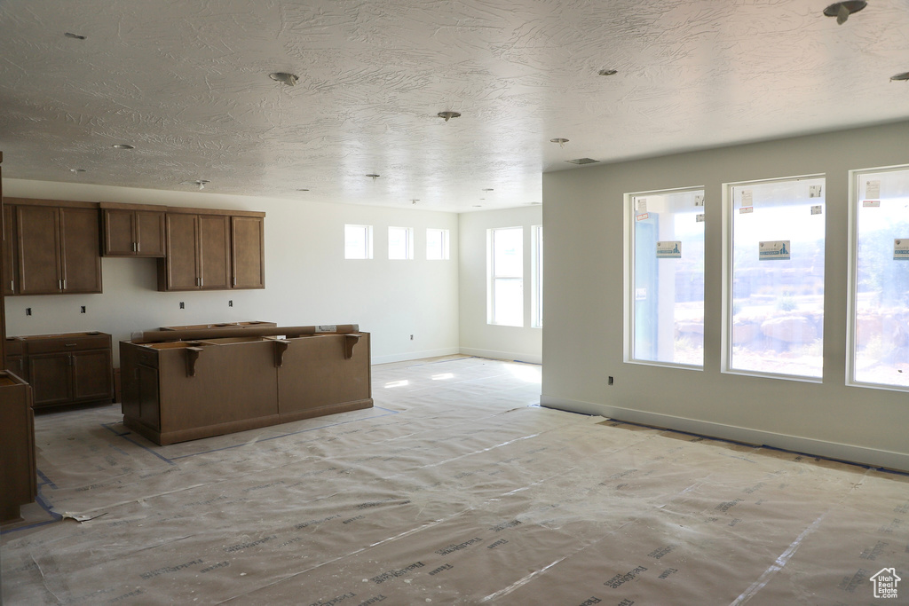 Kitchen featuring a kitchen breakfast bar and a center island