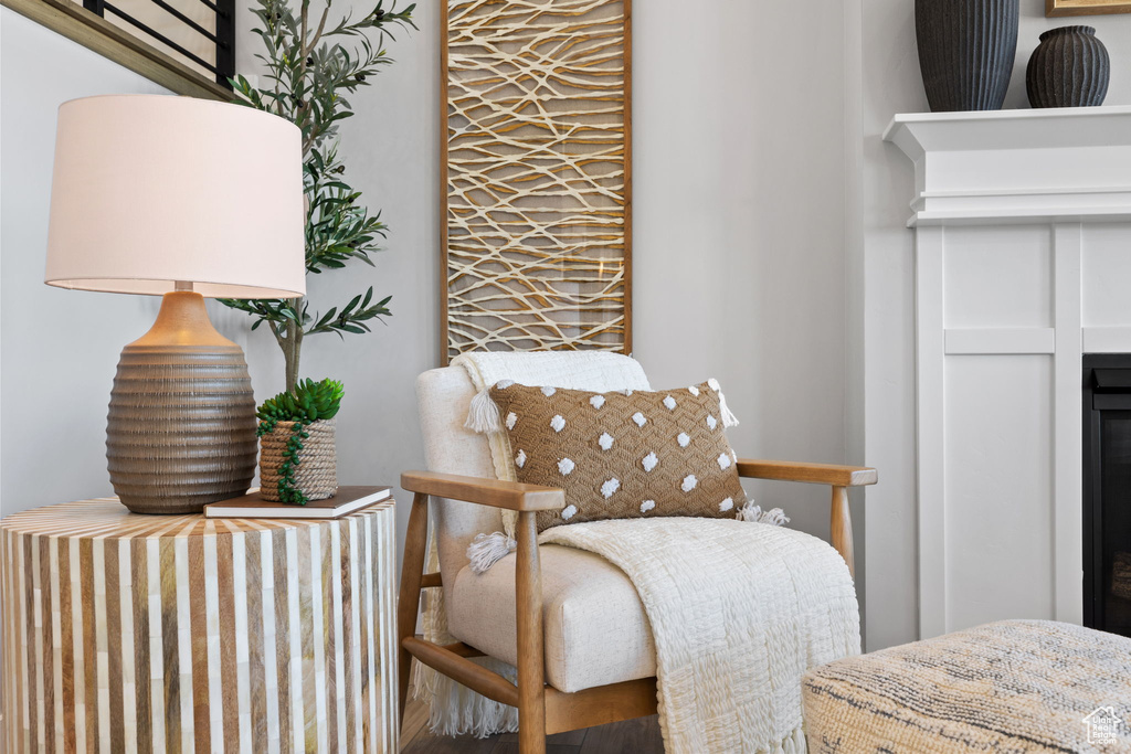 Sitting room with hardwood / wood-style floors