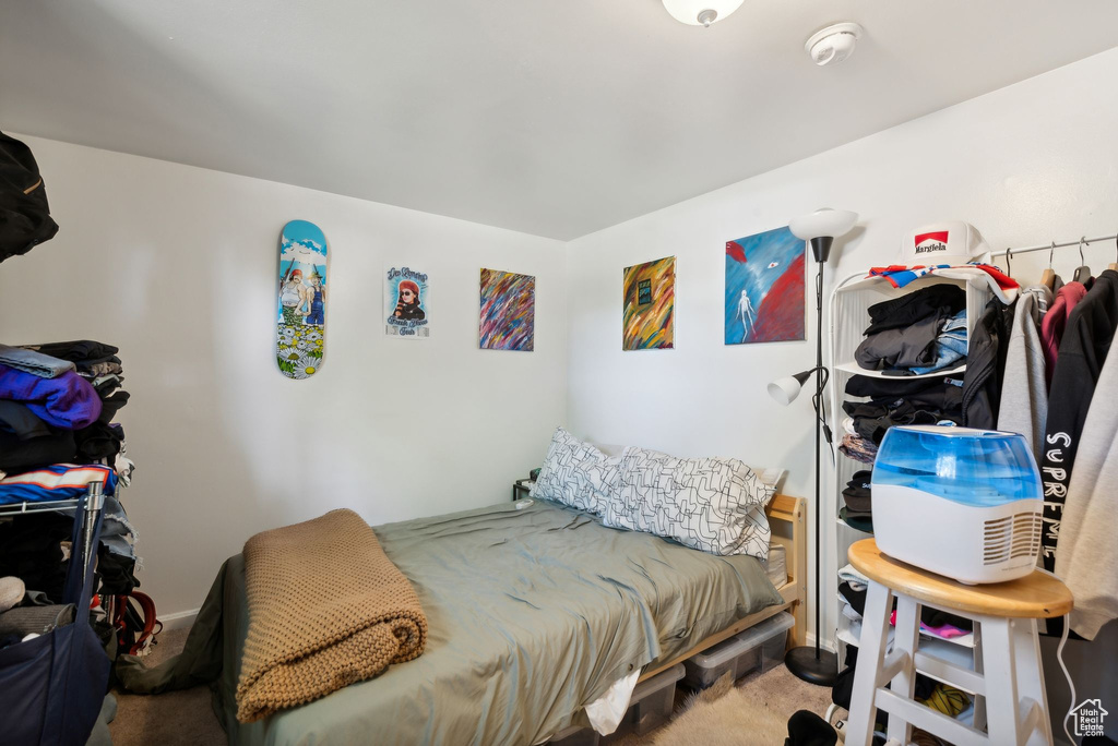 Bedroom featuring carpet