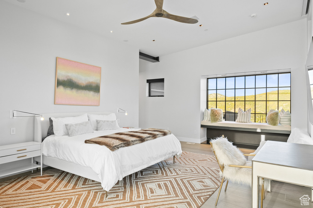 Bedroom featuring a ceiling fan and wood finished floors