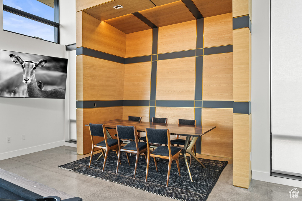 Dining space with finished concrete floors