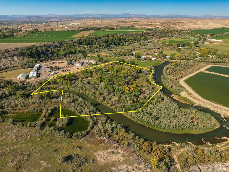 Drone / aerial view featuring a rural view and a water view