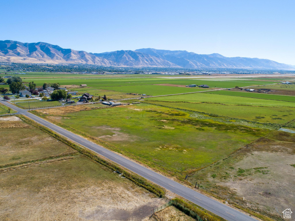Property view of mountains with a rural view