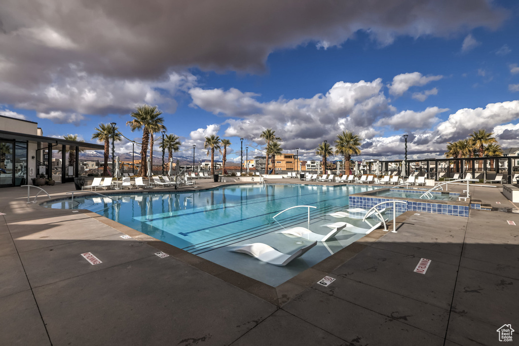 View of swimming pool featuring a patio